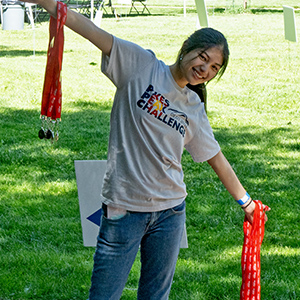 Volunteer holding medals